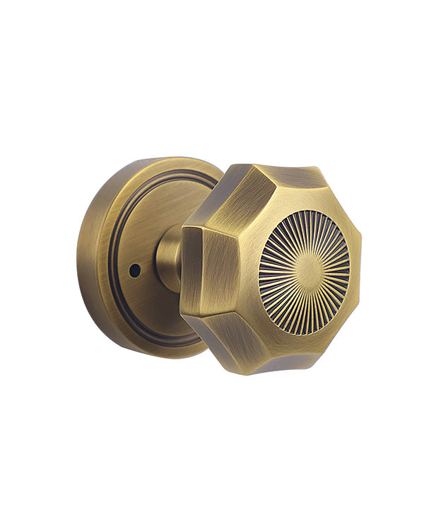 FLIRABBIT Antique Brass Privacy Door Knob Lock – Octagonal Sunburst Design, Solid Brass Handle Easy Install for Bedroom Bathroom Interior Doors (Antique Brass, Privacy-2.375)