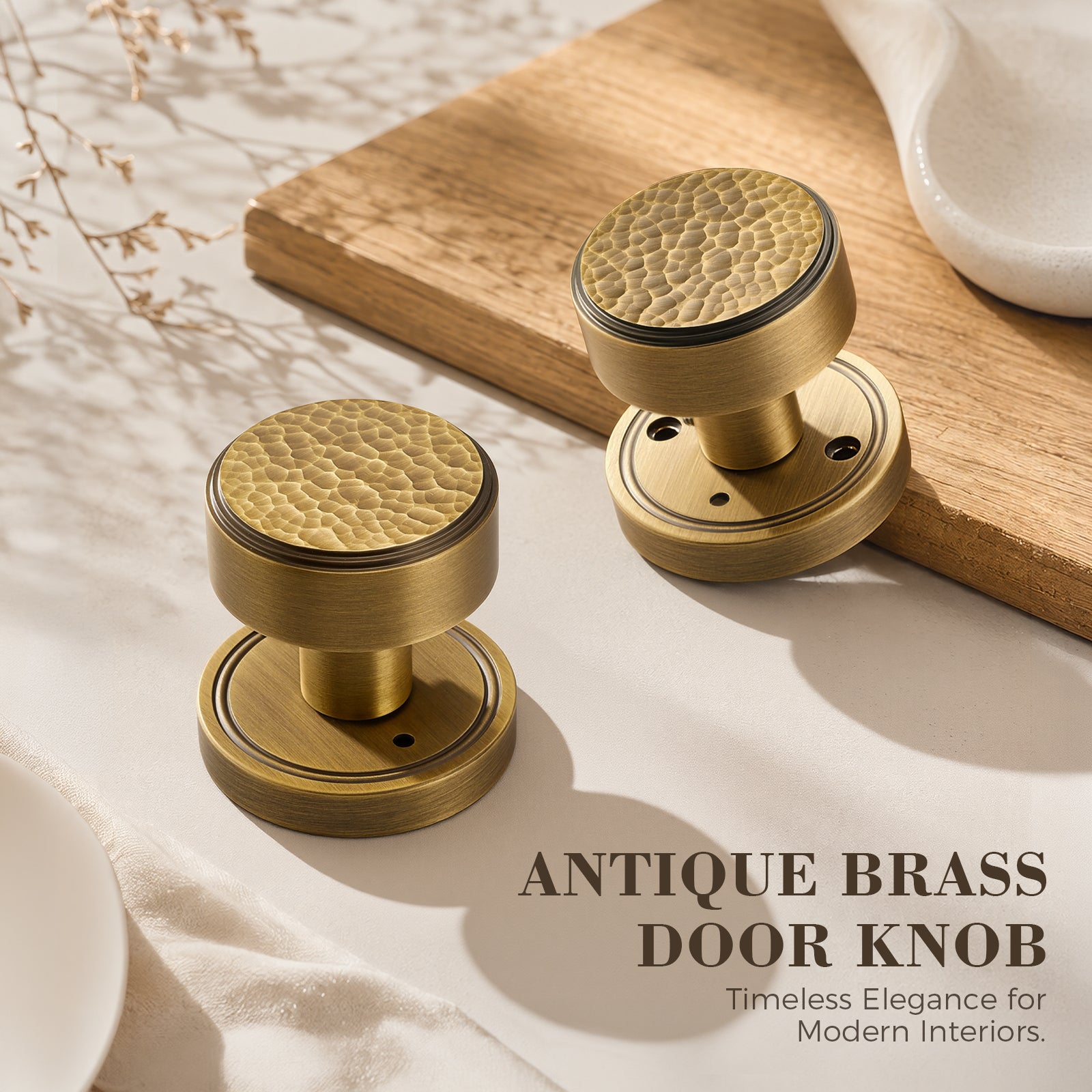 Antique brass door knobs with hammered texture on wooden display board
