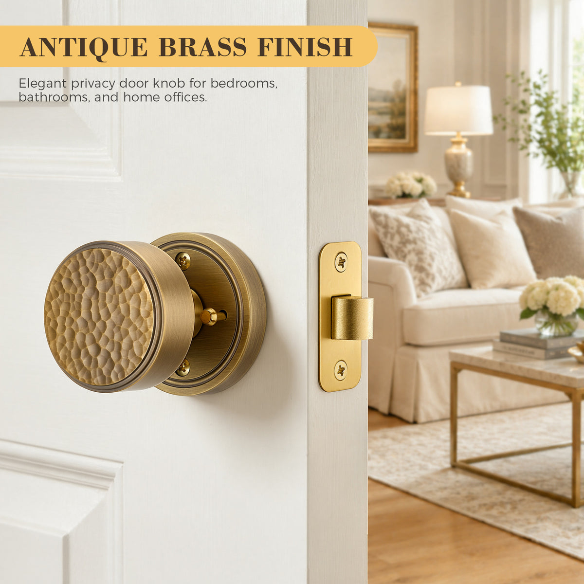 Antique brass privacy door knob with hammered texture installed on white interior door